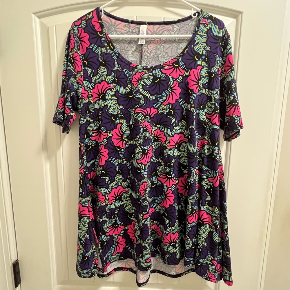 LuLaRoe ladies multi colored blouse